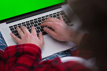 Image showing man freelancer in bathrobe working from home