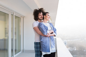 Image showing Couple hugging on the balcony