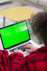 Image showing man freelancer in bathrobe working from home