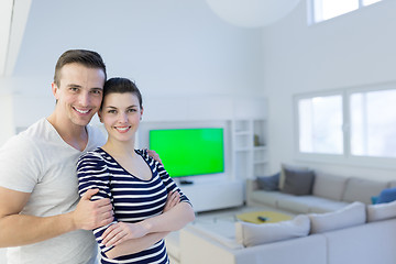 Image showing couple hugging in their new home