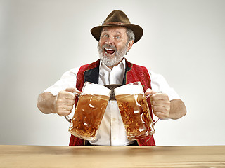 Image showing Germany, Bavaria, Upper Bavaria, man with beer dressed in traditional Austrian or Bavarian costume