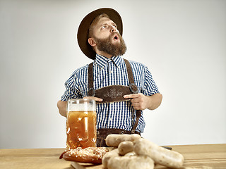 Image showing Germany, Bavaria, Upper Bavaria, man with beer dressed in traditional Austrian or Bavarian costume