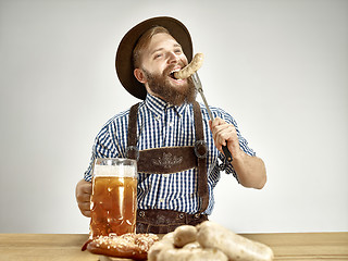 Image showing Germany, Bavaria, Upper Bavaria, man with beer dressed in traditional Austrian or Bavarian costume