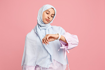 Image showing The arab woman in hijab. Portrait of serious girl, posing at studio background