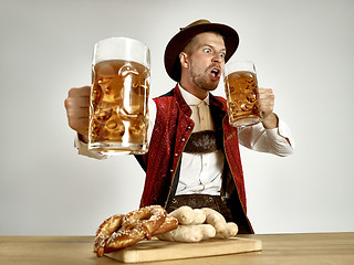 Image showing Germany, Bavaria, Upper Bavaria, man with beer dressed in traditional Austrian or Bavarian costume