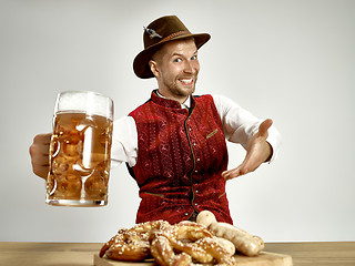 Image showing Germany, Bavaria, Upper Bavaria, man with beer dressed in traditional Austrian or Bavarian costume