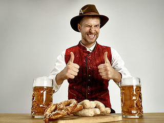 Image showing Germany, Bavaria, Upper Bavaria, man with beer dressed in traditional Austrian or Bavarian costume