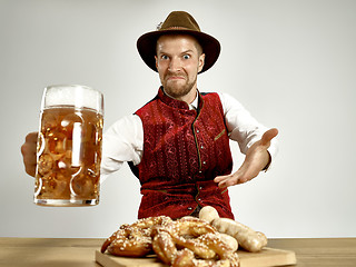 Image showing Germany, Bavaria, Upper Bavaria, man with beer dressed in traditional Austrian or Bavarian costume