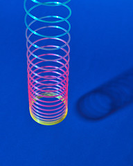 Image showing Classic colored plastic spring hungs with shadow.