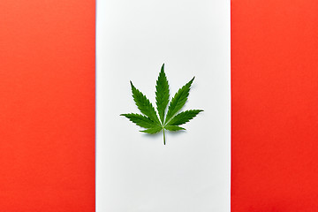 Image showing Altered Canadian flag with green cannabis leaf