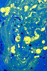 Image showing Mixed acrylic paint background in yellow-blue colours.