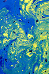 Image showing Mixed acrylic paint background with a marble effect.