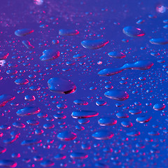 Image showing Water drops background highlighted with ultraviolet.