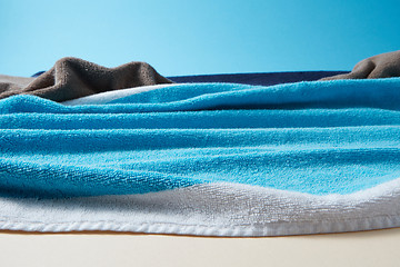 Image showing Handmade waves of blue sea made from beach terry towels.