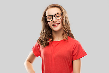 Image showing smiling student girl in glasses and red t-shirt