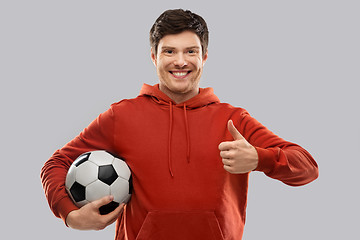 Image showing male football fan with soccer ball shows thumbs up