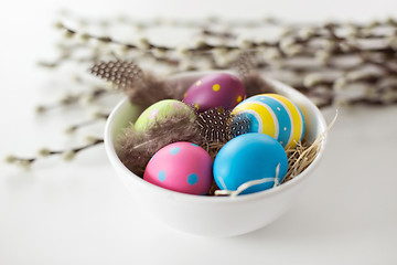 Image showing colored easter eggs and pussy willow branches