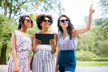 Image showing women with tablet computer on street in summer