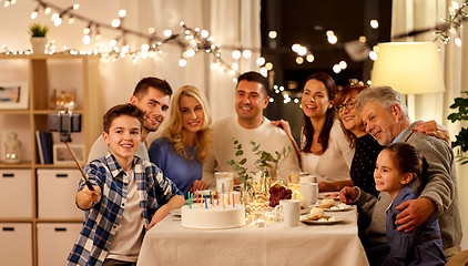 Image showing family having birthday party and taking selfie