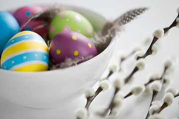 Image showing colored easter eggs and pussy willow branches