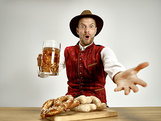 Image showing Germany, Bavaria, Upper Bavaria, man with beer dressed in traditional Austrian or Bavarian costume