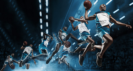 Image showing Collage. Basketball player on big professional arena during the game. Basketball player making slam dunk.