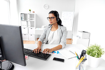 Image showing businesswoman with computer working at office