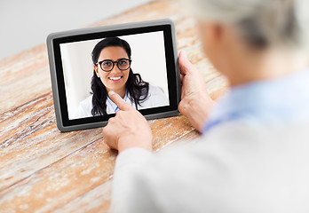 Image showing senior woman patient having video call with doctor