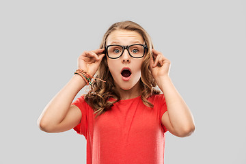 Image showing surprised or shocked teenage girl in glasses