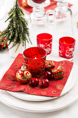 Image showing Christmas And New Year Holiday Table Setting.  Place setting for Christmas Dinner. Holiday Decorations. 