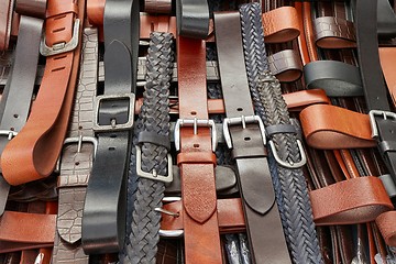 Image showing Leather belts at a market