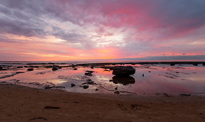 Image showing Beautiful morning reflections on the tidal rocks at Bateau Bay Australia