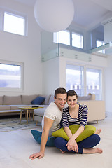 Image showing couple sitting on the floor at home