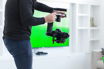 Image showing videographer at work