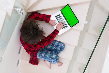 Image showing freelancer in bathrobe working from home