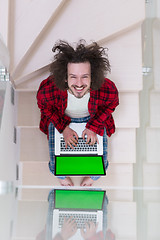 Image showing freelancer in bathrobe working from home