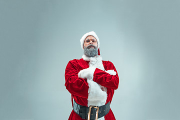 Image showing Funny guy in christmas hat. New Year Holiday. Christmas, x-mas, winter, gifts concept.