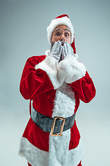 Image showing Funny guy in christmas hat. New Year Holiday. Christmas, x-mas, winter, gifts concept.