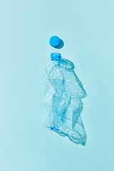 Image showing Crumpled plastic bottle with shadows.