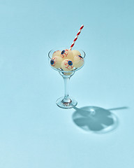 Image showing Glass with Halloween cocktail with human eyeballs.