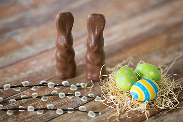 Image showing easter eggs, chocolate bunnies and pussy willow