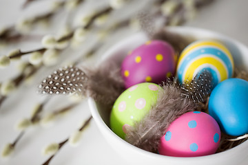 Image showing colored easter eggs and pussy willow branches