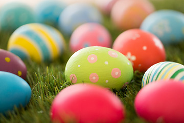 Image showing colored easter eggs on artificial grass