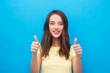 Image showing young woman or teenage girl showing thumbs up