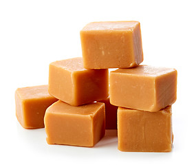 Image showing caramel candies on white background