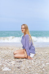 Image showing Beautiful happy girl on the Adriatic beach. Travel and vacation.