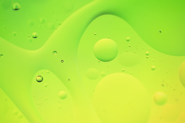Image showing Green and yellow abstract background picture made with oil, water and soap