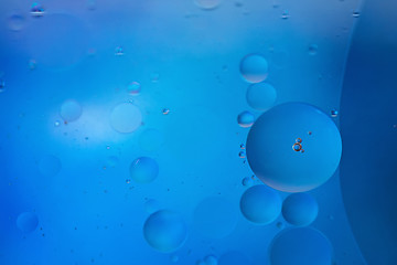 Image showing Blue abstract background picture made with oil, water and soap