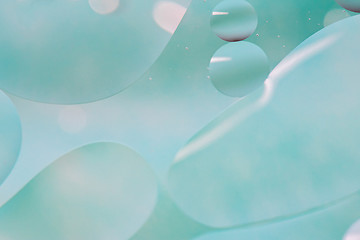 Image showing Light blue abstract background picture made with oil, water and soap