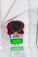 Image showing freelancer in bathrobe working from home